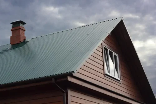 Green Metal Roof Under Cloudy Sky Idaho Falls, ID